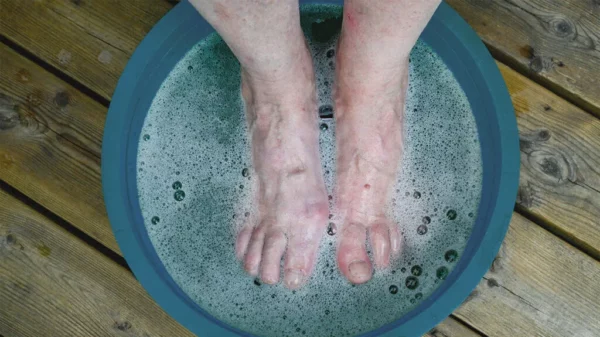 feet soaked in basin