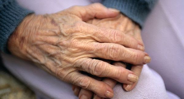 elder person with thick nails